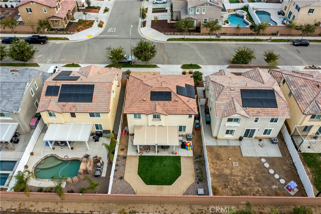 30271 Ramsay Drive Menifee, CA 92584 - Photo 31 of 34 an aerial view of multiple houses with outdoor space