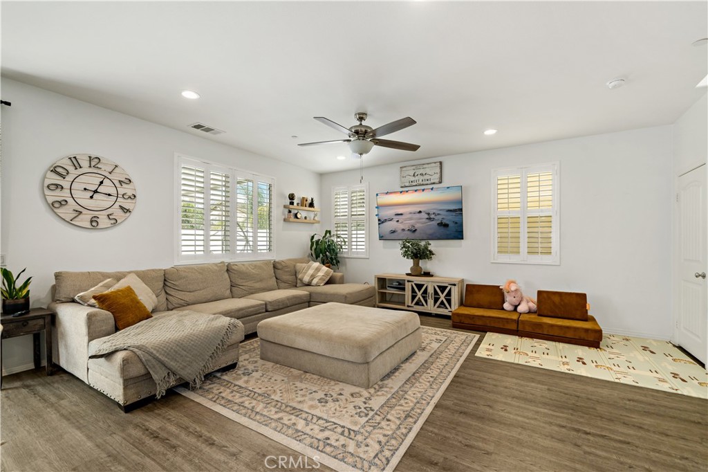 30271 Ramsay Drive Menifee, CA 92584 - Photo 4 of 34 a living room with furniture and a window