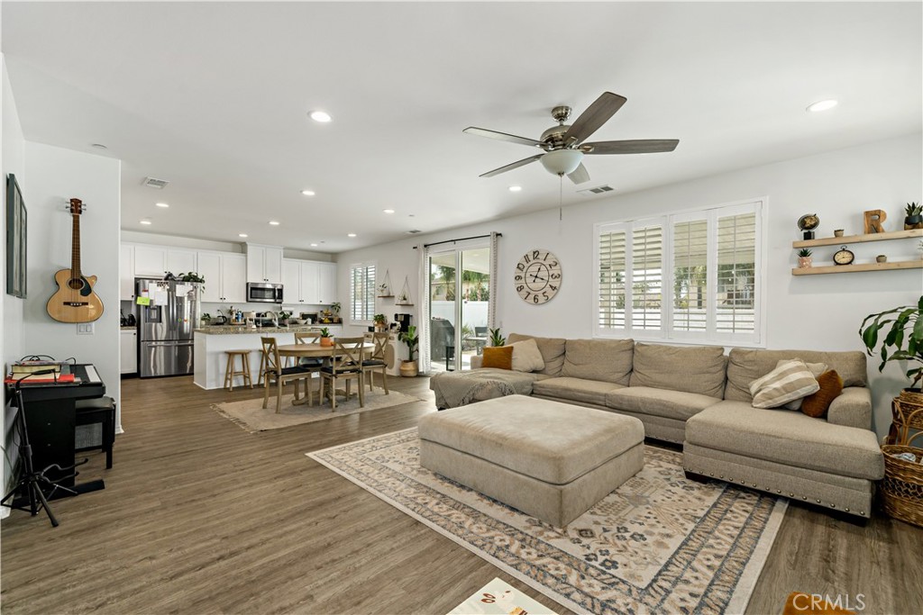 30271 Ramsay Drive Menifee, CA 92584 - Photo 5 of 34 a living room with furniture and wooden floor