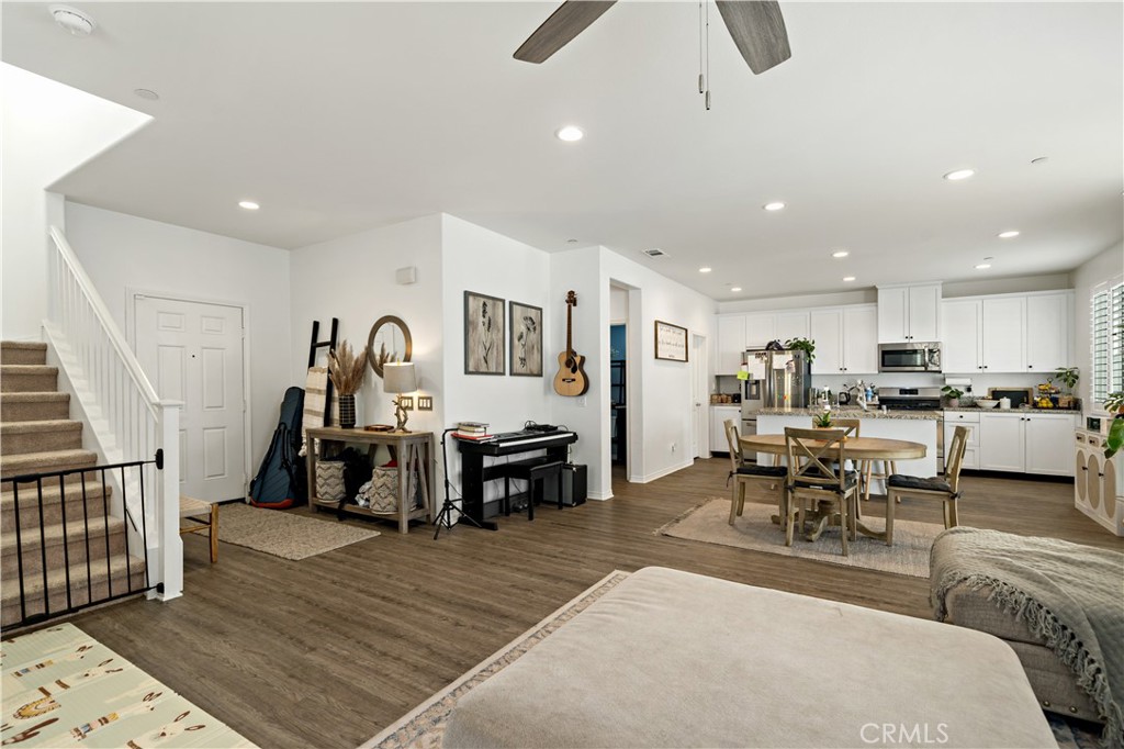 30271 Ramsay Drive Menifee, CA 92584 - Photo 6 of 34 a living room with furniture and kitchen view
