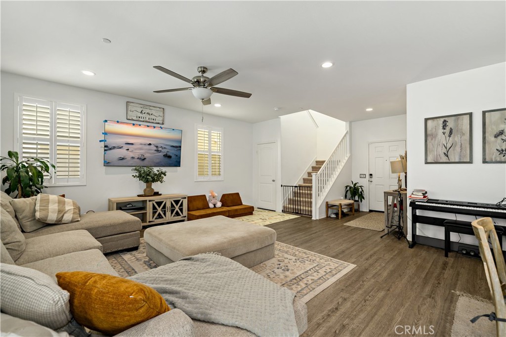 30271 Ramsay Drive Menifee, CA 92584 - Photo 7 of 34 a living room with furniture and wooden floor