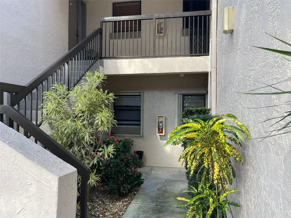 a view of balcony with flower plants
