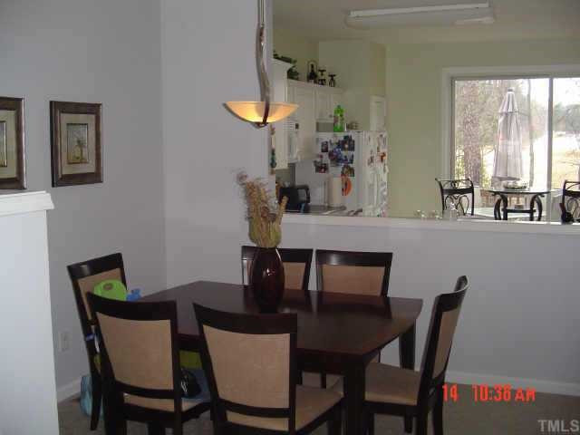 1648 Brook Fern Way Raleigh, NC 27609 - Photo 4 of 10 Great sized dinning room that is wide open to both the kitchen and the living room. Other