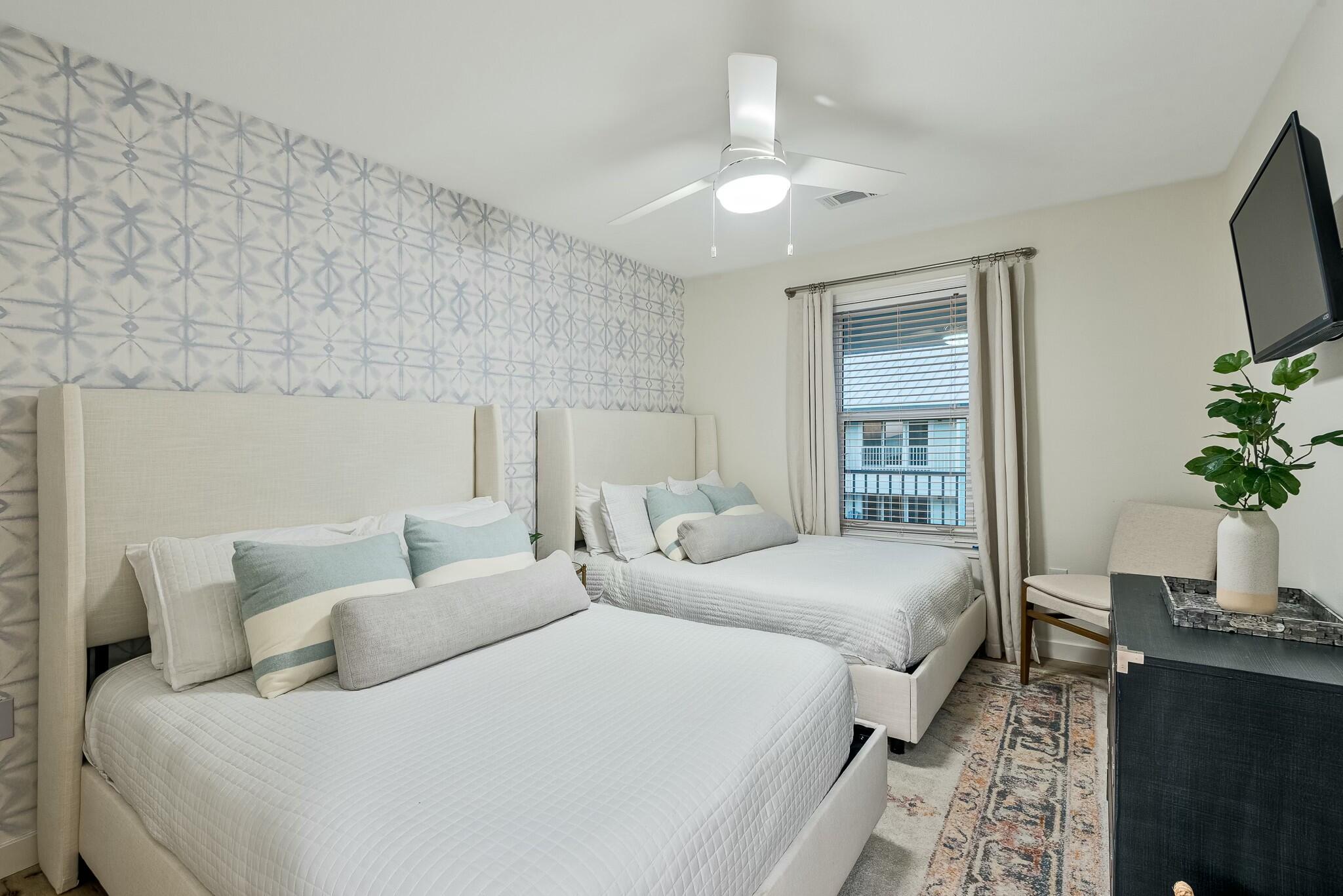 11 Beachside Drive, Unit 632 Santa Rosa Beach, FL 32459 - Photo 19 of 40 a bedroom with bed and a potted plant