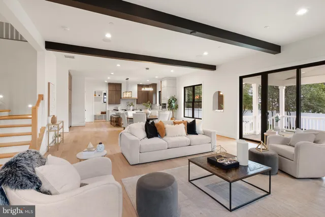 a kitchen with stainless steel appliances kitchen island granite countertop a sink and cabinets