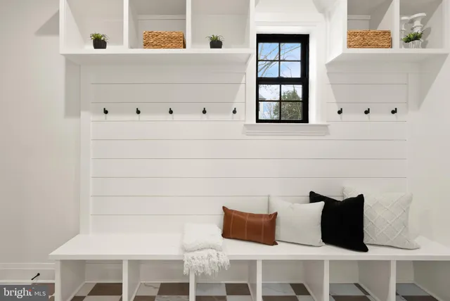 a view of a wooden deck and a yard