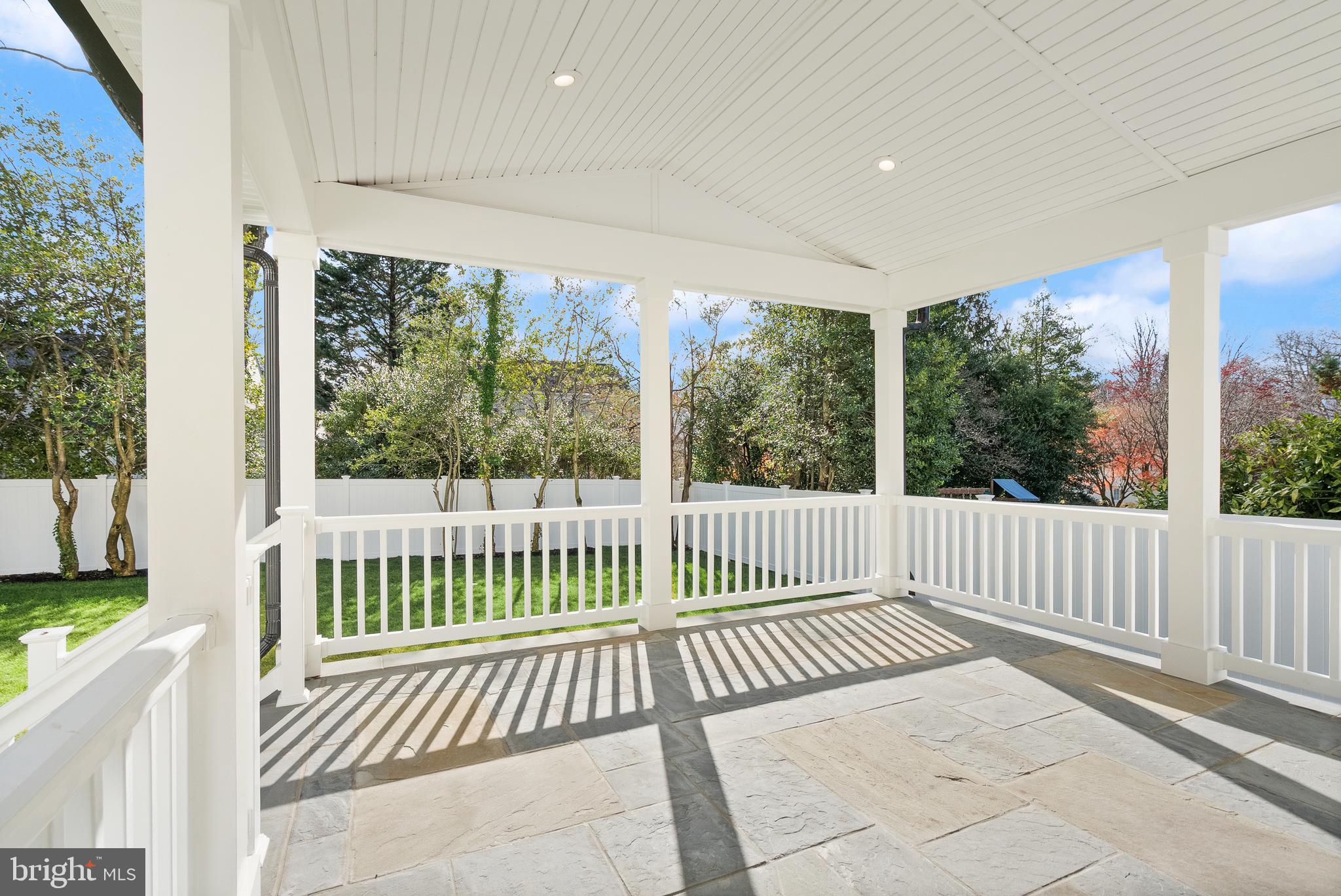 5804 Ridgefield Road Bethesda, MD 20816 - Photo 26 of 53 a view of a porch with a wooden fence