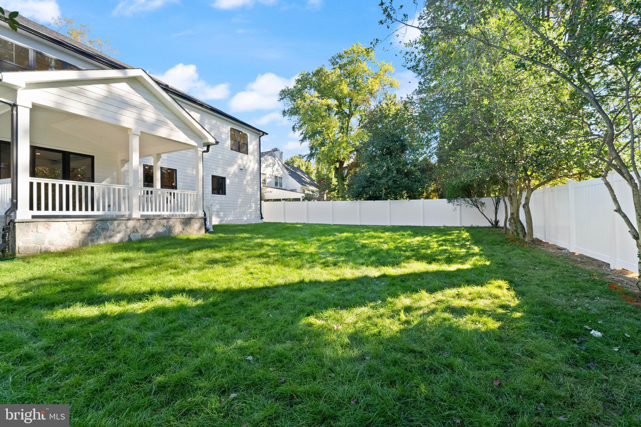 5804 Ridgefield Road Bethesda, MD 20816 - Photo 3 of 56 a house that is sitting in the grass