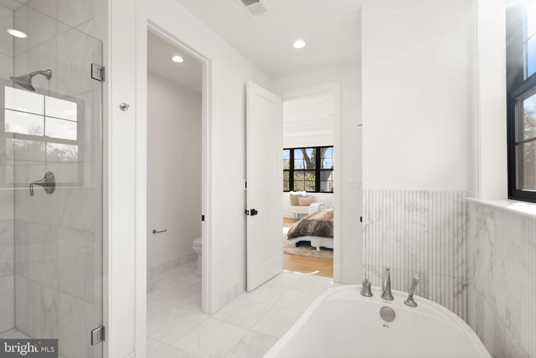 5804 Ridgefield Road Bethesda, MD 20816 - Photo 36 of 53 a bathroom with a sink and mirror