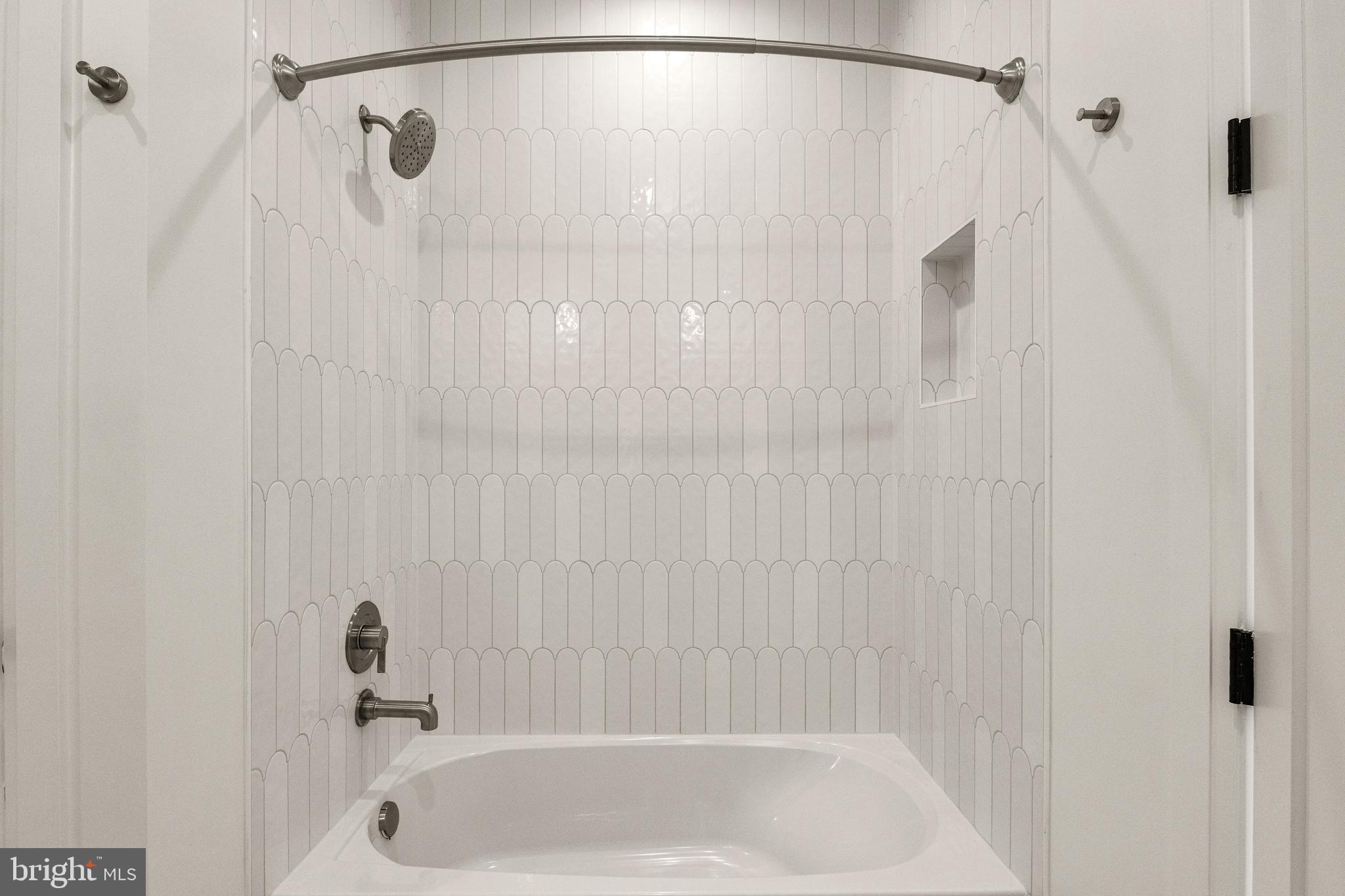 5804 Ridgefield Road Bethesda, MD 20816 - Photo 47 of 56 a bathroom with a shower and a shower