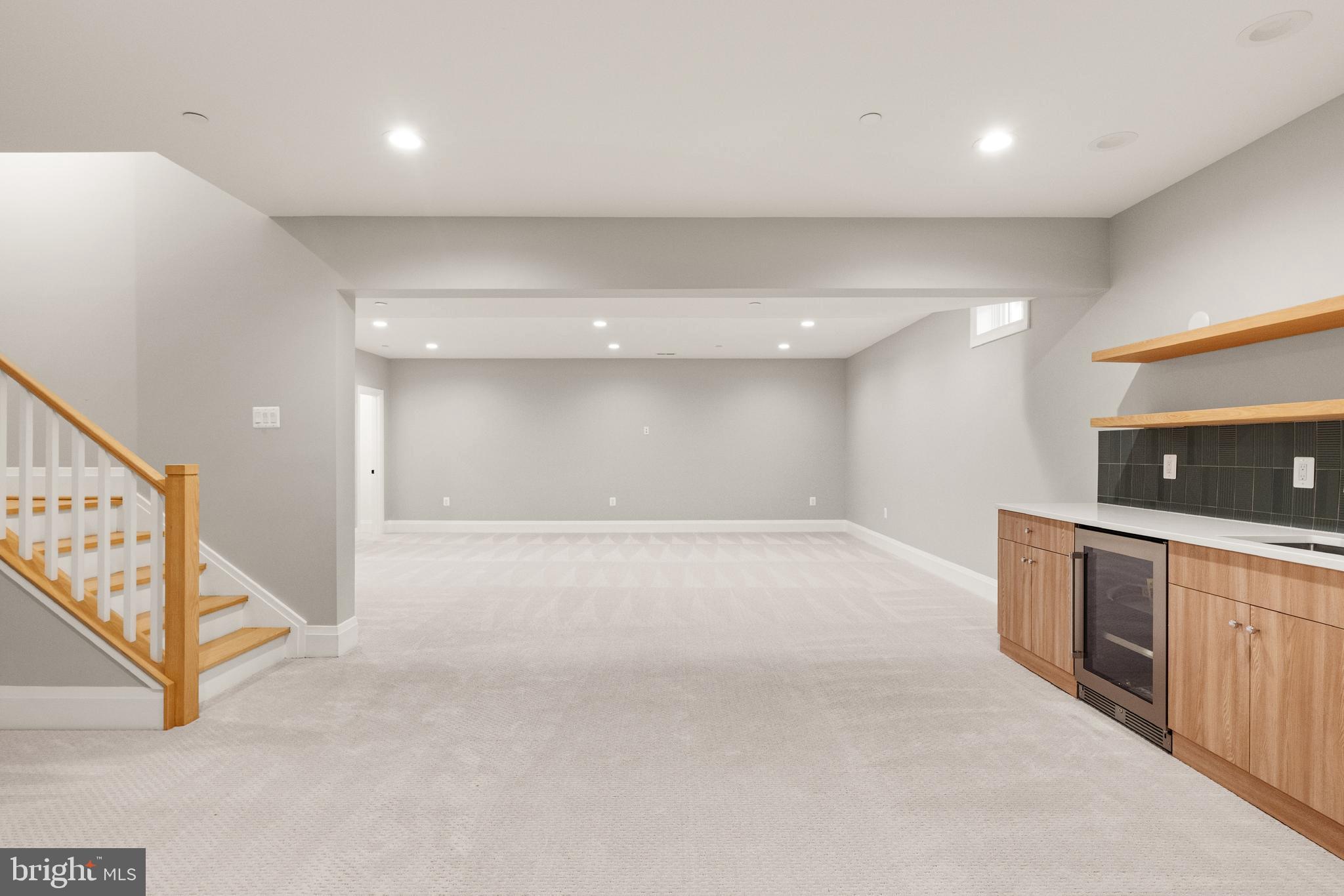 5804 Ridgefield Road Bethesda, MD 20816 - Photo 49 of 56 a view of an empty room with wooden floor