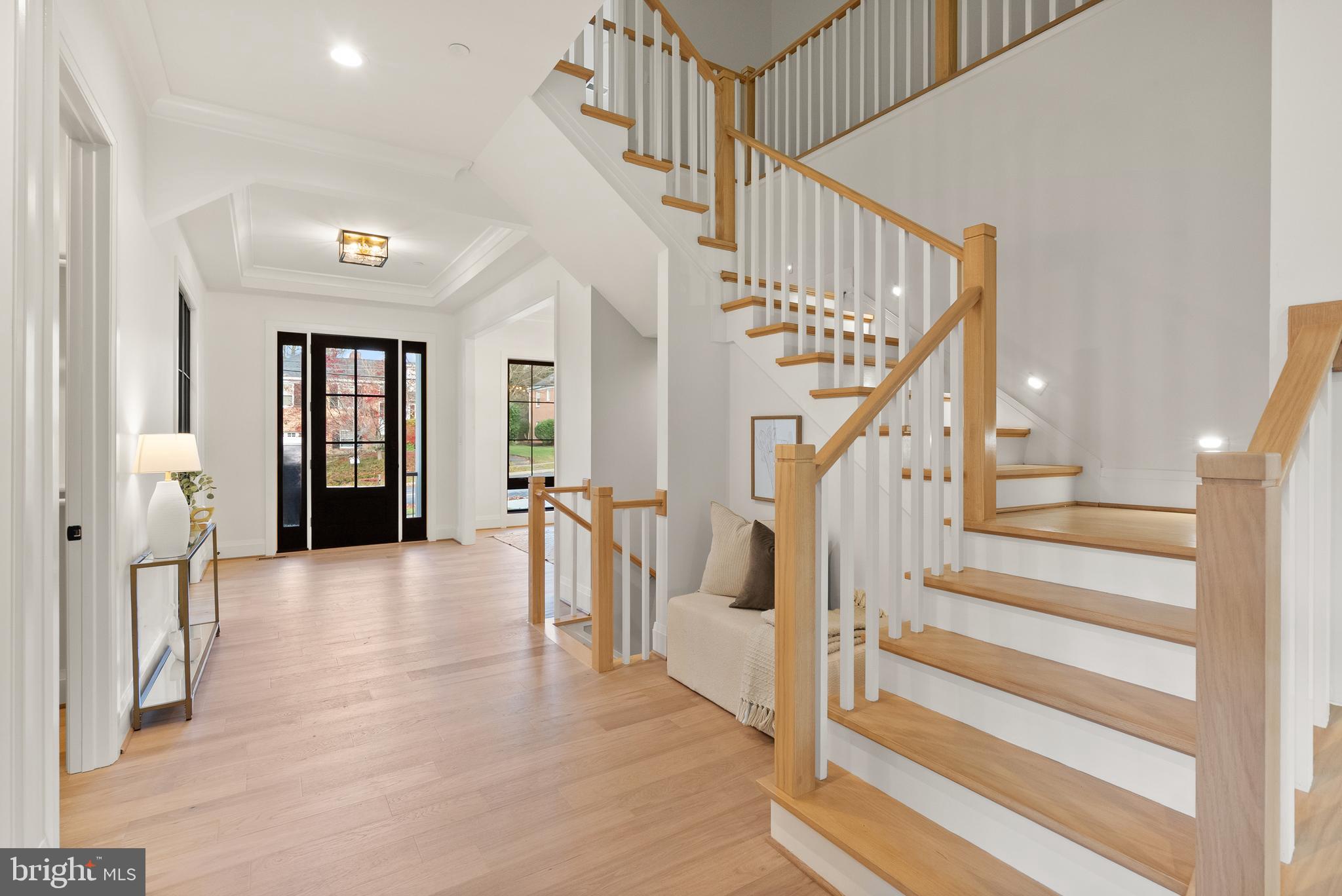 5804 Ridgefield Road Bethesda, MD 20816 - Photo 10 of 53 a view of entryway and hall with wooden floor