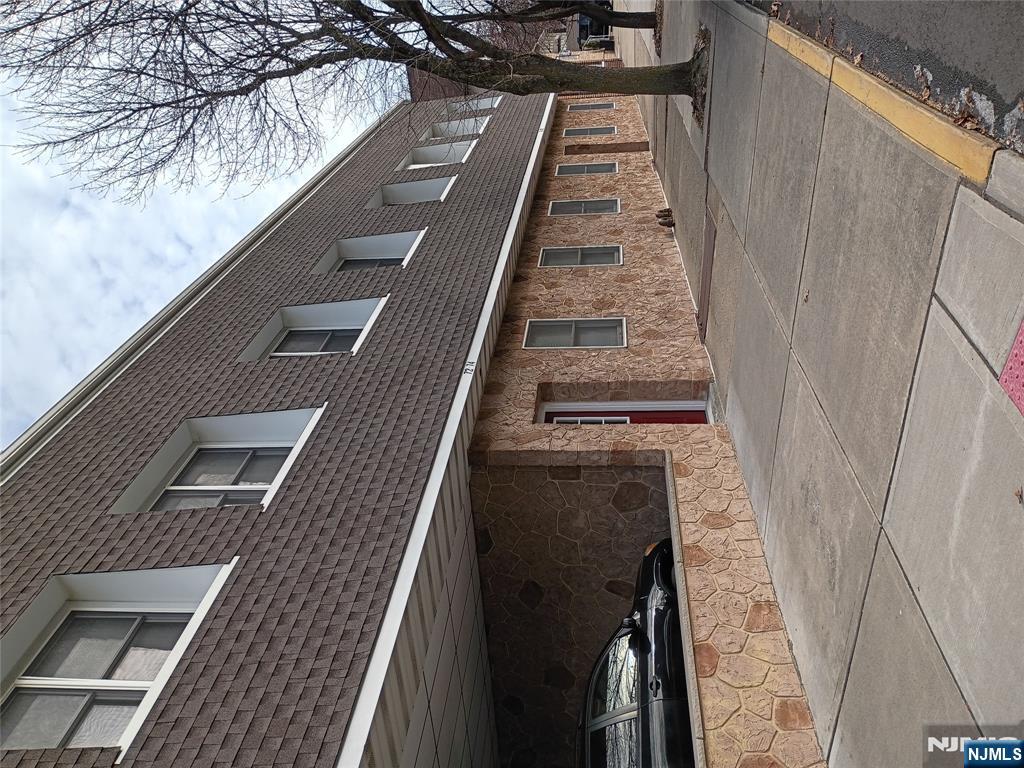 a front view of a house with a outdoor space