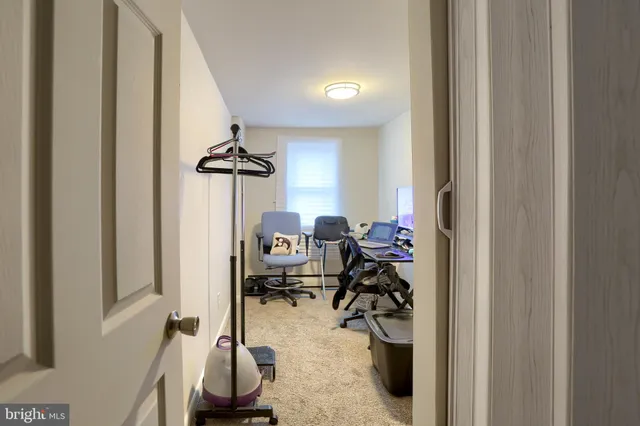 a view of a workspace with furniture