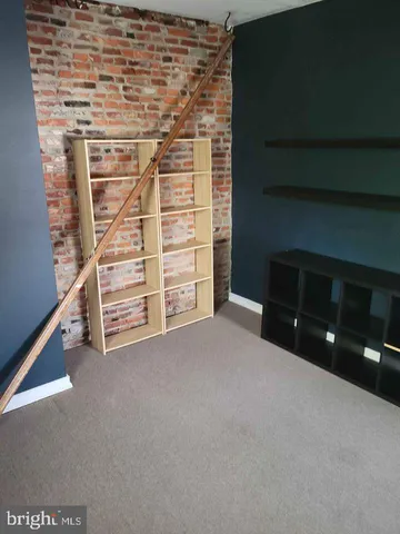 a view of a livingroom with an empty space