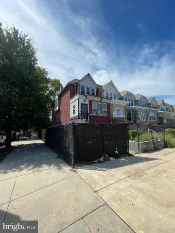 a view of a house with a roof deck