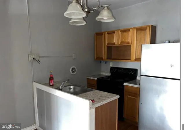 a view of hallway with cabinets