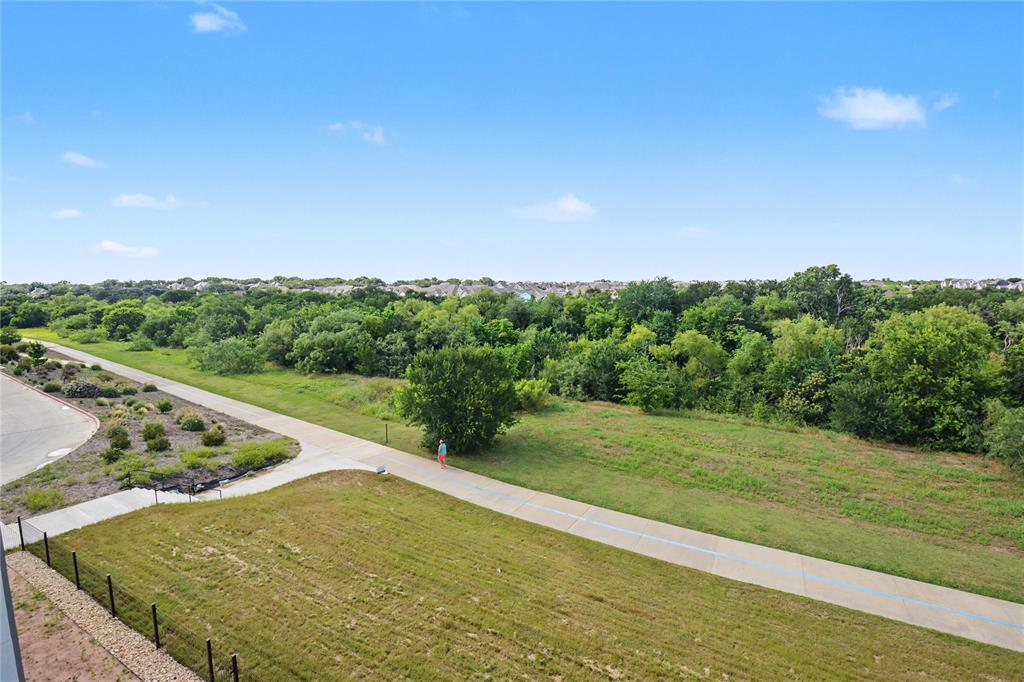 1111 Raiford Road, Unit 104 Carrollton, TX 75007 - Photo 16 of 30 a view of a yard with an outdoor seating