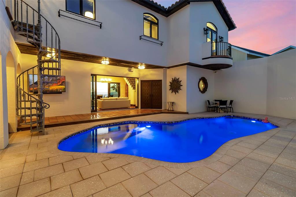 121 North Casey Key Road Osprey, FL 34229 - Photo 51 of 63 a view of swimming pool with seating area
