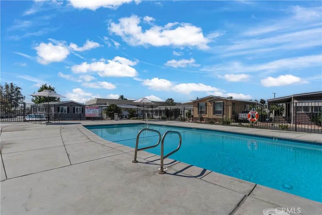 301 East Foothill Boulevard, Unit 34 Pomona, CA 91767 - Photo 24 of 35 a dinning table and chairs in the patio