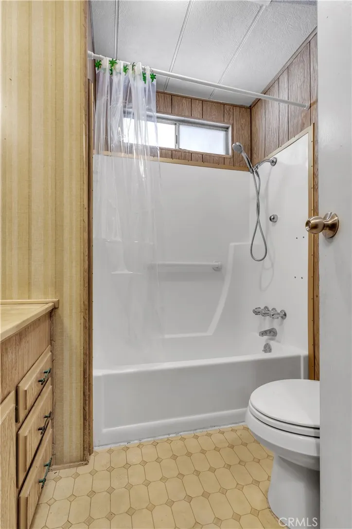 301 East Foothill Boulevard, Unit 34 Pomona, CA 91767 - Photo 7 of 35 a bathroom with a toilet and a shower