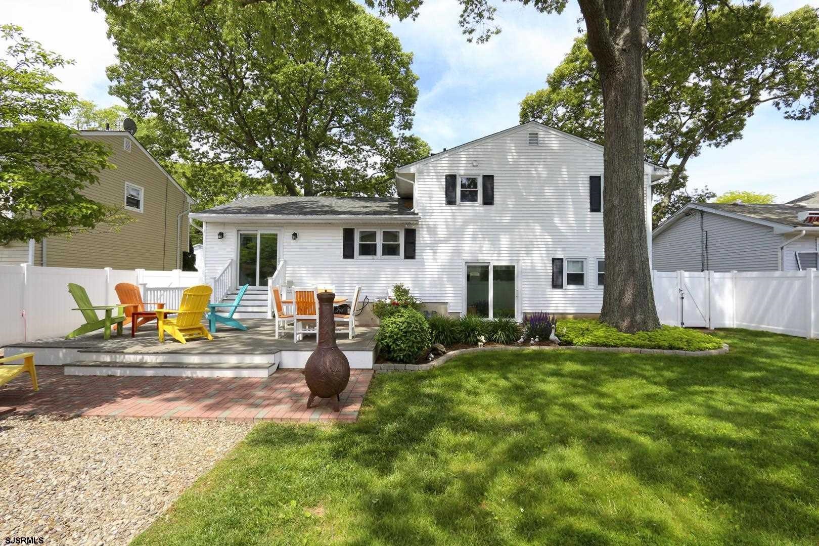 204 Bliss Avenue Somers Point, NJ 08244 - Photo 12 of 18 a view of a house with backyard
