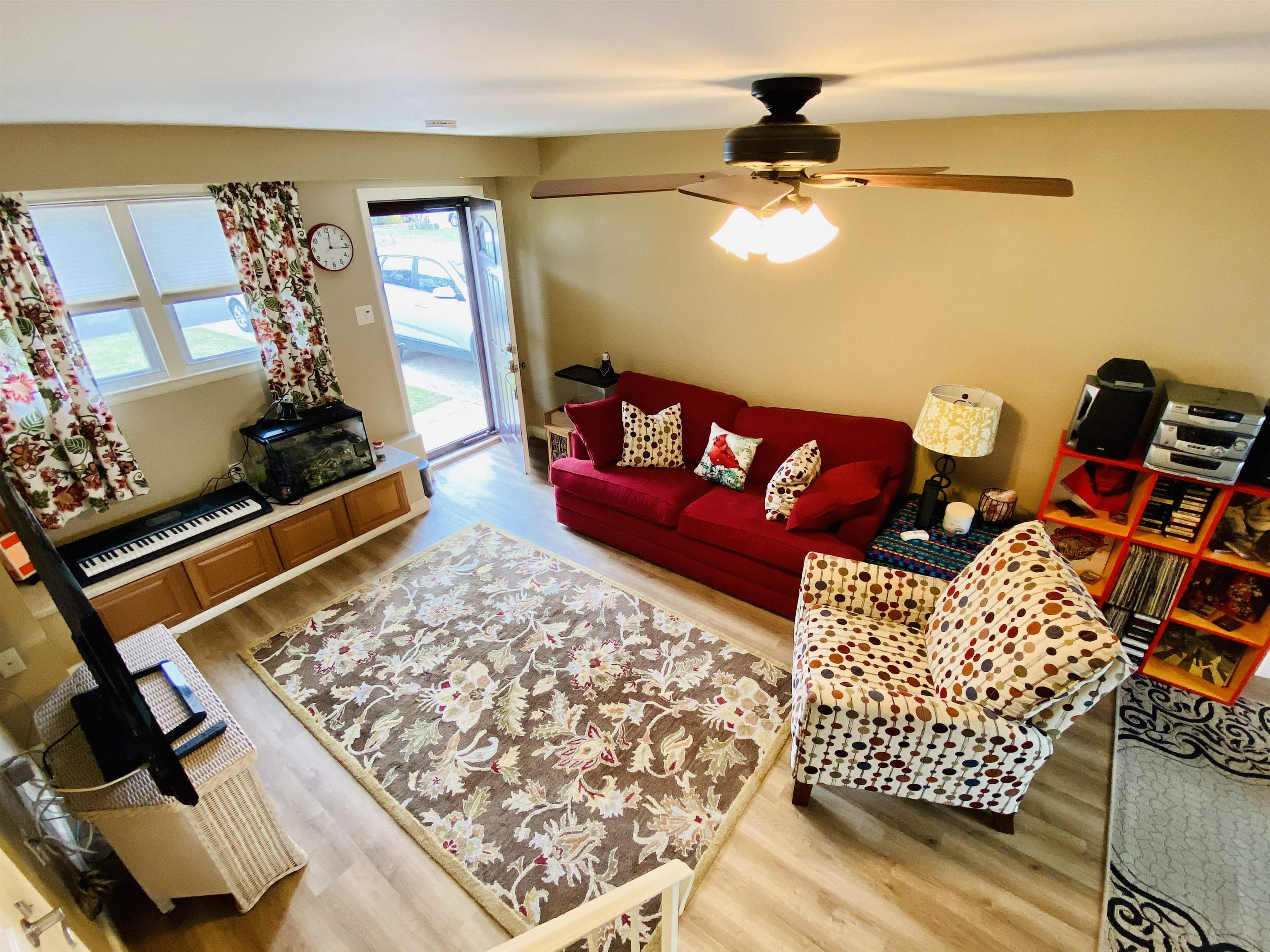204 Bliss Avenue Somers Point, NJ 08244 - Photo 13 of 18 a living room with furniture and a rug