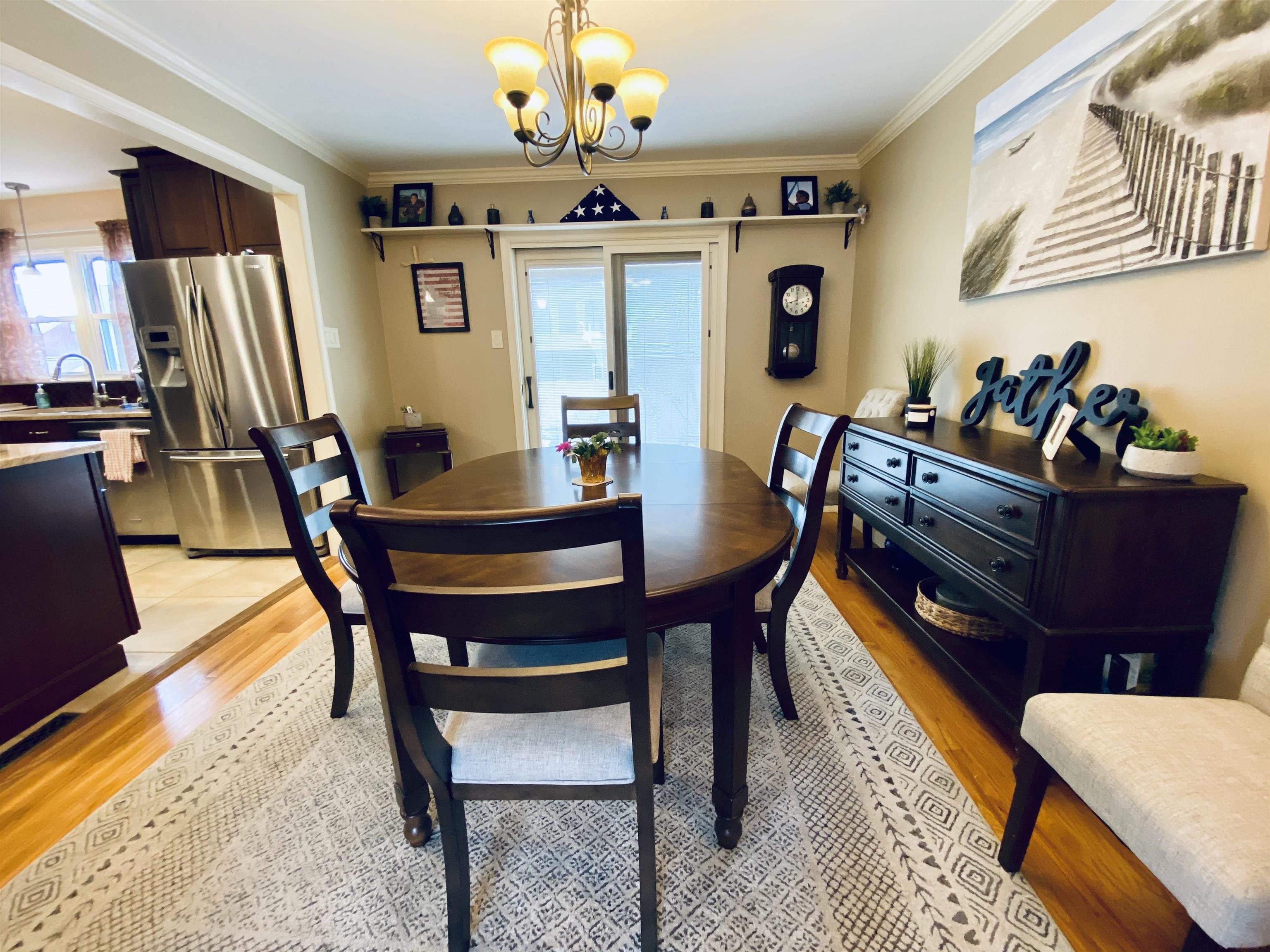 204 Bliss Avenue Somers Point, NJ 08244 - Photo 7 of 18 a view of a dining room with furniture