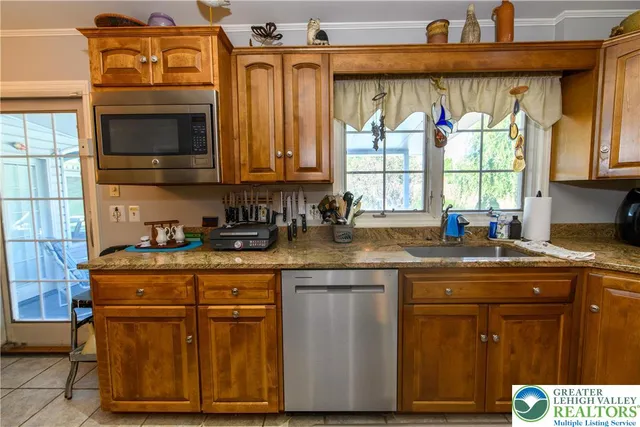 a bathroom with a sink double vanity and a mirror