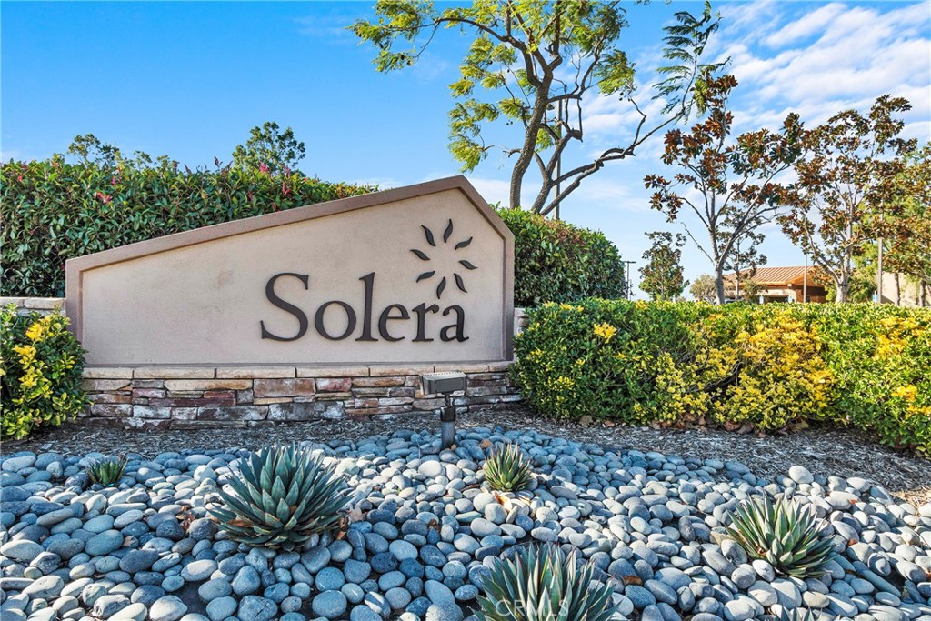 930 Gleneagles Road Beaumont, CA 92223 - Photo 36 of 40 a sign that is sitting in front of flowers