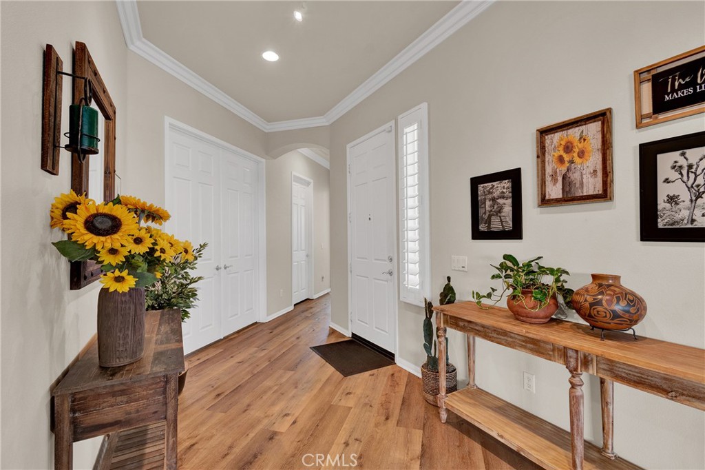 930 Gleneagles Road Beaumont, CA 92223 - Photo 8 of 40 a bathroom with a double vanity sink and a mirror