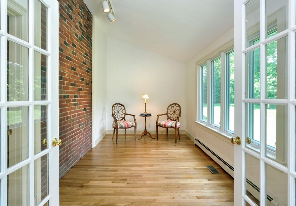 40 Upland Road Duxbury, MA 02332 - Photo 14 of 38 a view of a balcony with chairs
