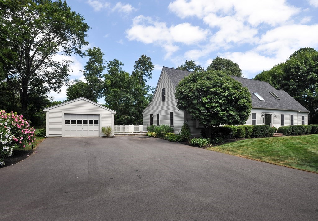 40 Upland Road Duxbury, MA 02332 - Photo 9 of 38 a view of a house with a big yard and large tree