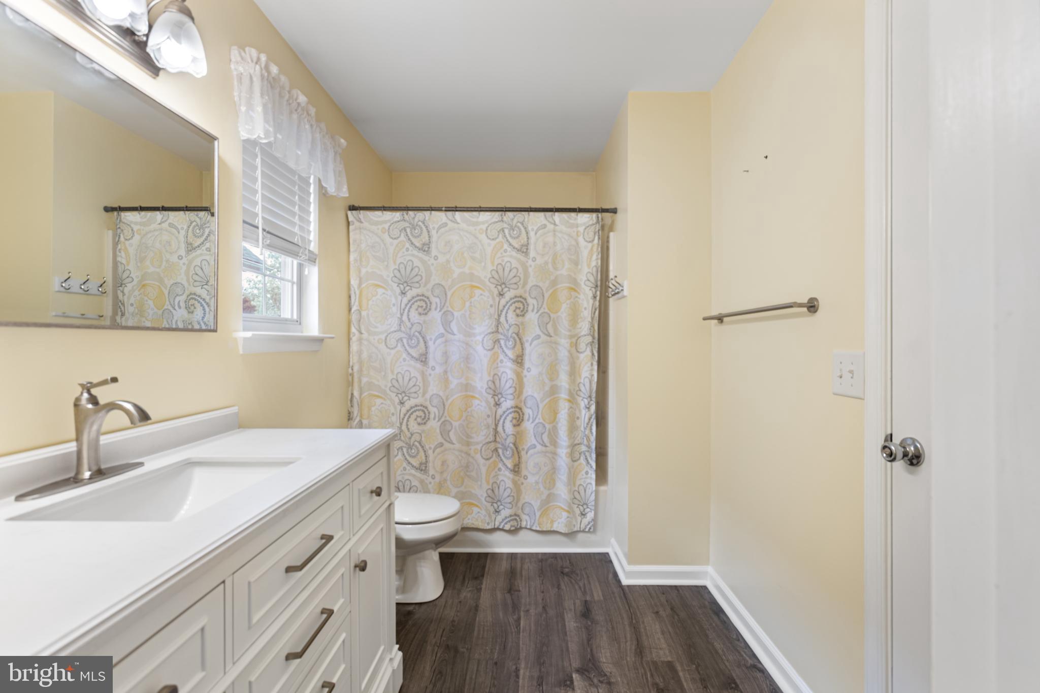 2 Kerrin Road Bear, DE 19701 - Photo 16 of 29 a bathroom with a sink a toilet and a mirror