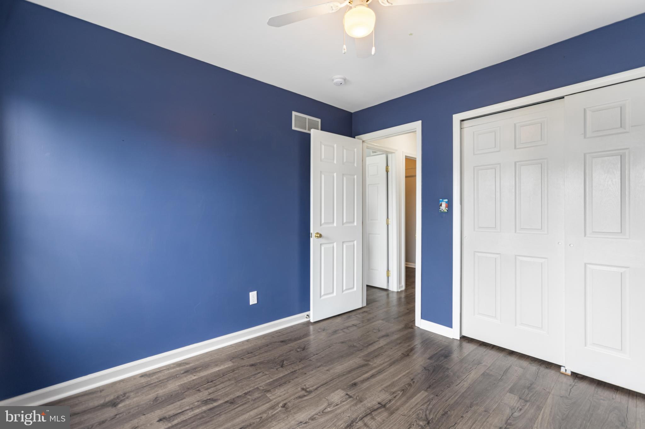 2 Kerrin Road Bear, DE 19701 - Photo 24 of 29 a view of an empty room with wooden floor
