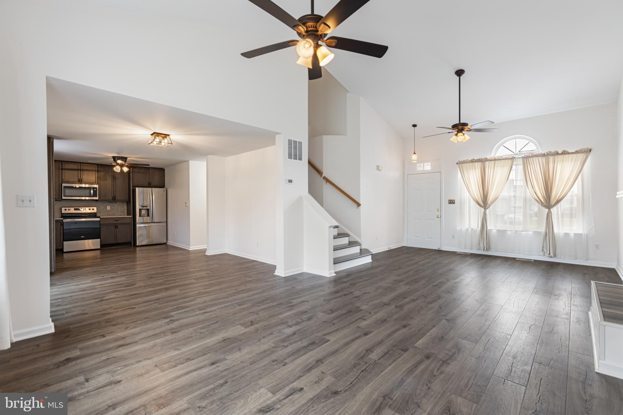 2 Kerrin Road Bear, DE 19701 - Photo 6 of 29 wooden floor in an empty room with a window