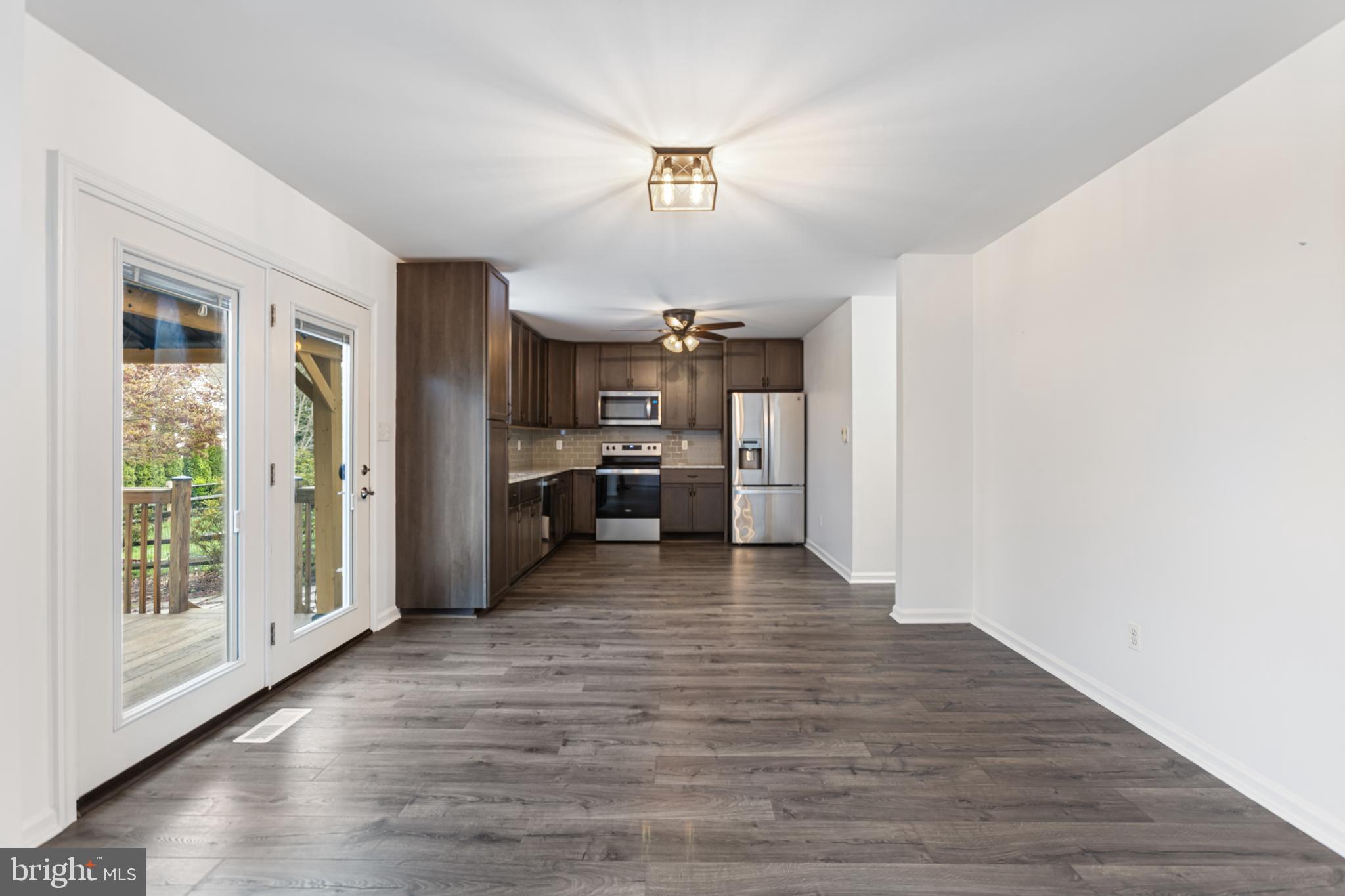 2 Kerrin Road Bear, DE 19701 - Photo 8 of 29 a view of a kitchen with a sink cabinet a refrigerator and window