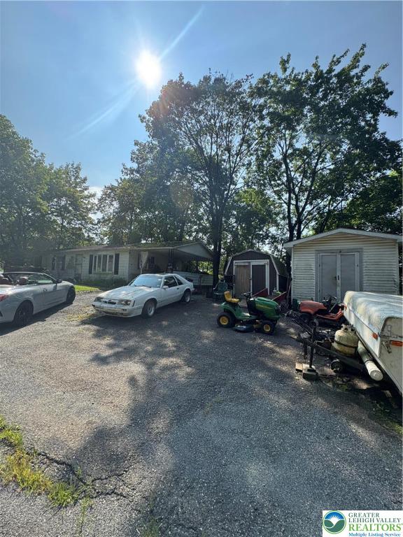 211 Fireline Road Bowmanstown, PA 18071 - Photo 3 of 4 a view of a backyard with sitting area