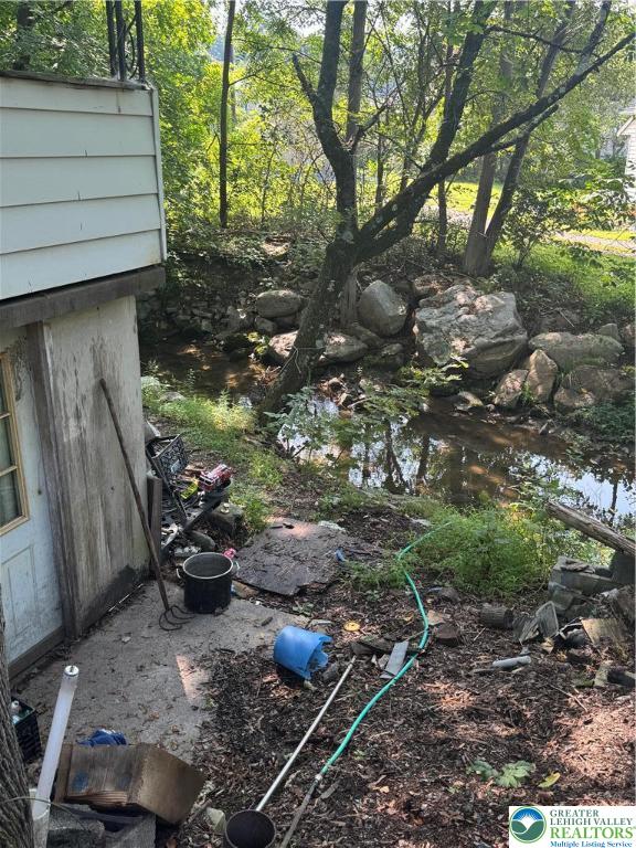 211 Fireline Road Bowmanstown, PA 18071 - Photo 4 of 4 a backyard of a house with lots of green space
