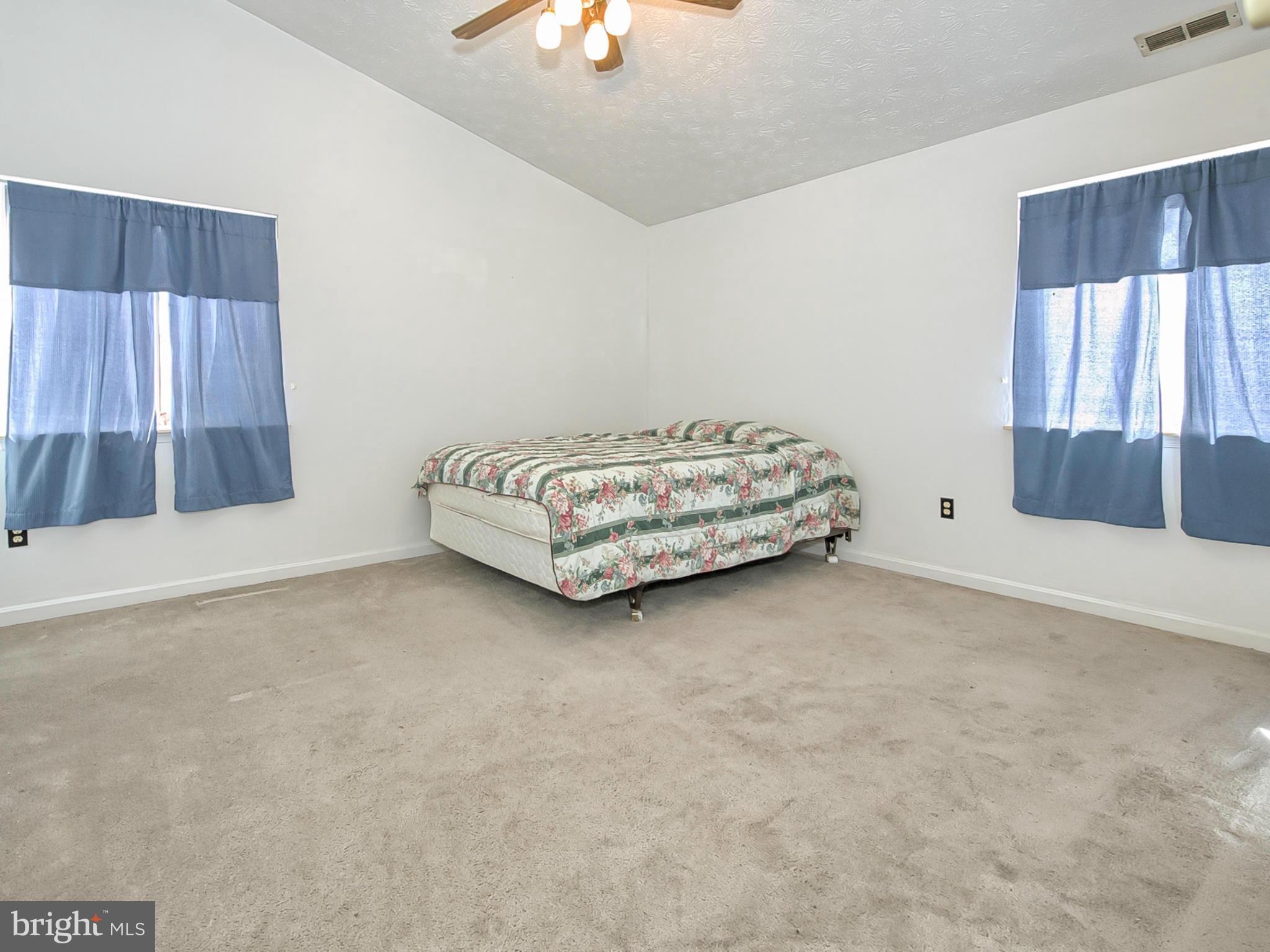 2137 Wainwright Court, Unit 2B Frederick, MD 21702 - Photo 16 of 30 a living room with furniture and window