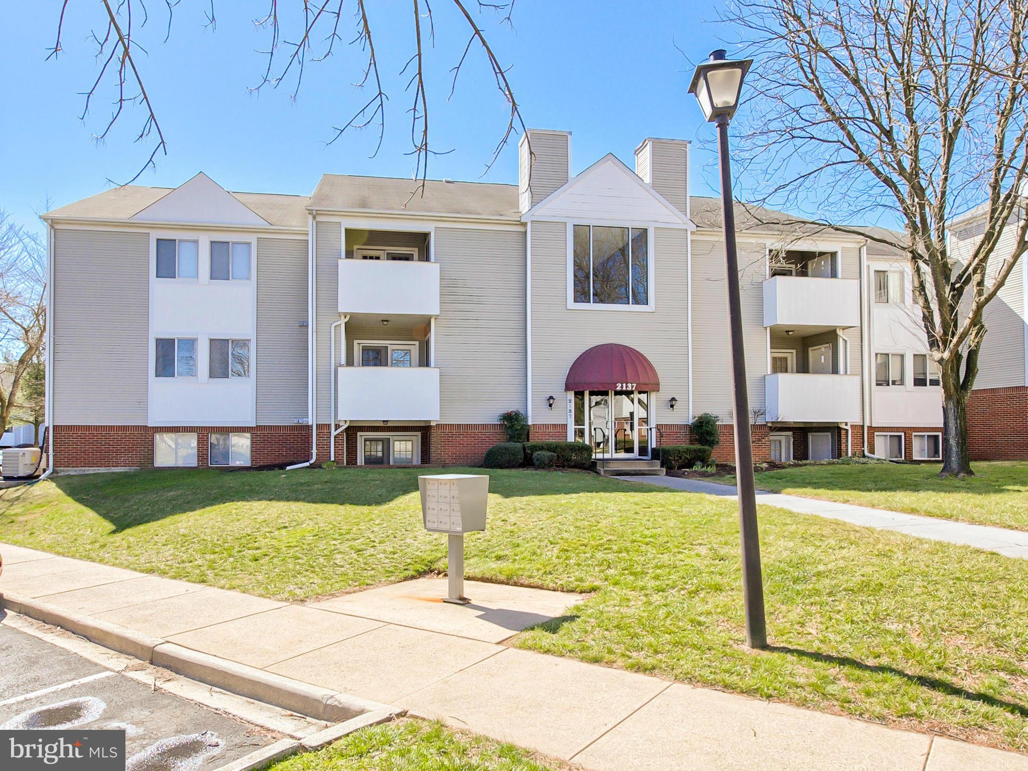 2137 Wainwright Court, Unit 2B Frederick, MD 21702 - Photo 3 of 30 a front view of a house with garden