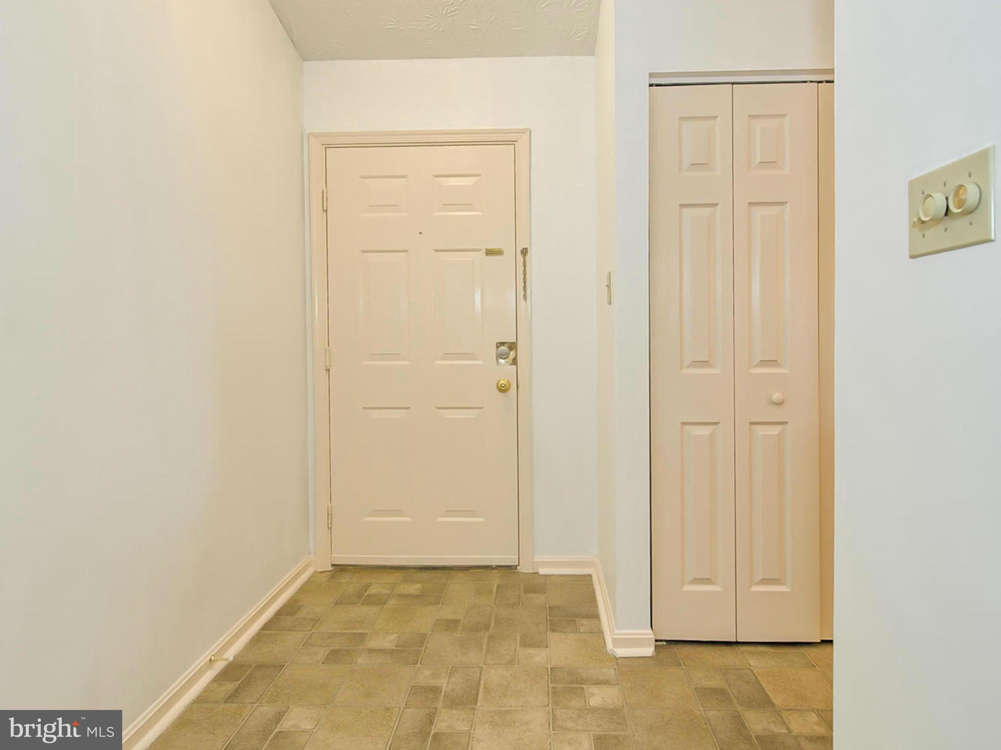 2137 Wainwright Court, Unit 2B Frederick, MD 21702 - Photo 25 of 30 an empty room with windows