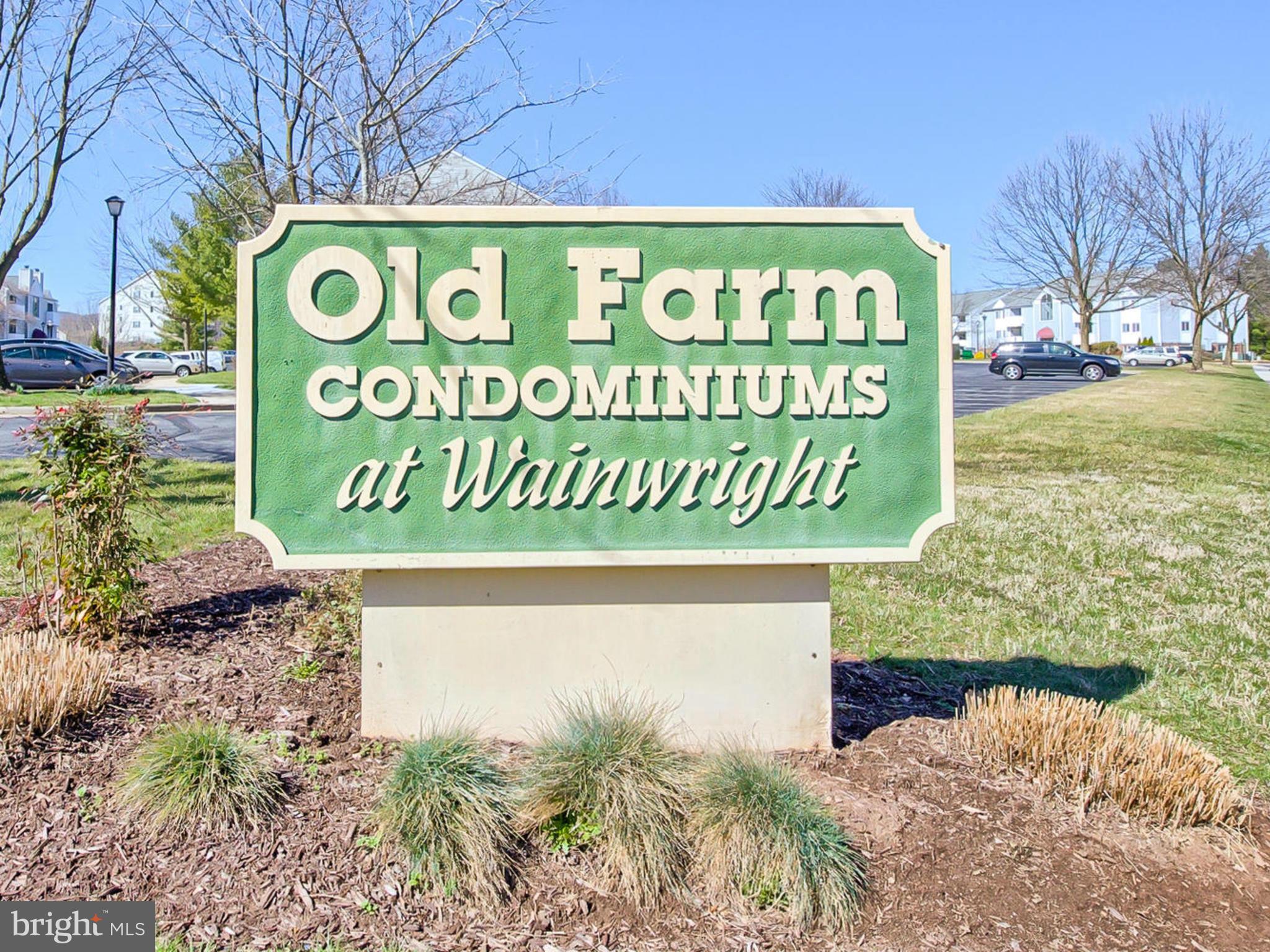 2137 Wainwright Court, Unit 2B Frederick, MD 21702 - Photo 26 of 30 a sign that is on a brick wall