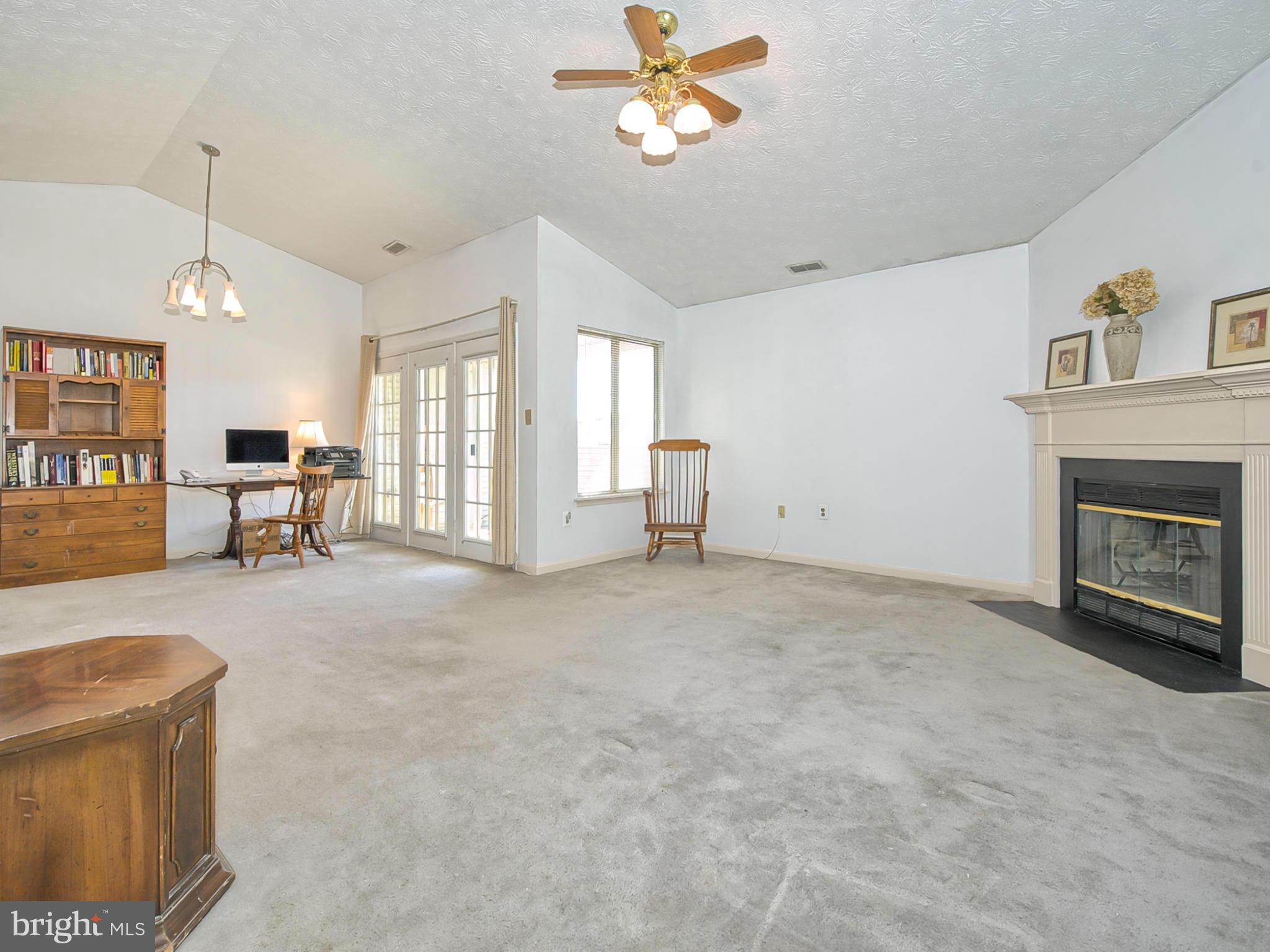 2137 Wainwright Court, Unit 2B Frederick, MD 21702 - Photo 8 of 30 a view of livingroom with furniture fireplace and window