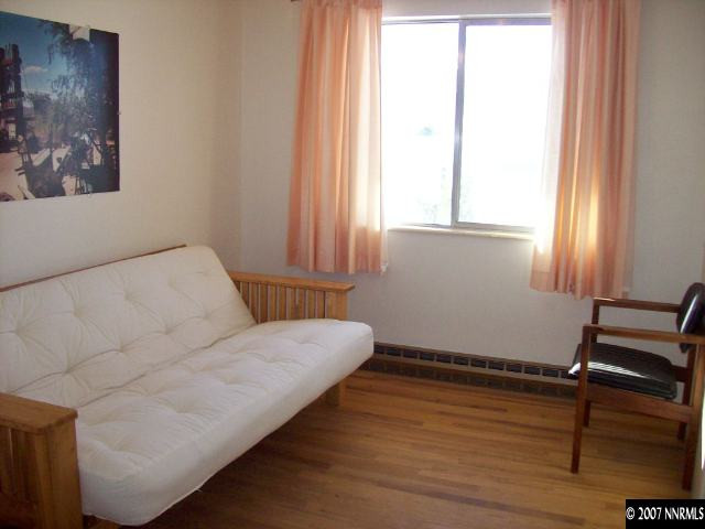 14580 Chamy Drive Reno, NV 89521 - Photo 8 of 9 a room with a bed and a window