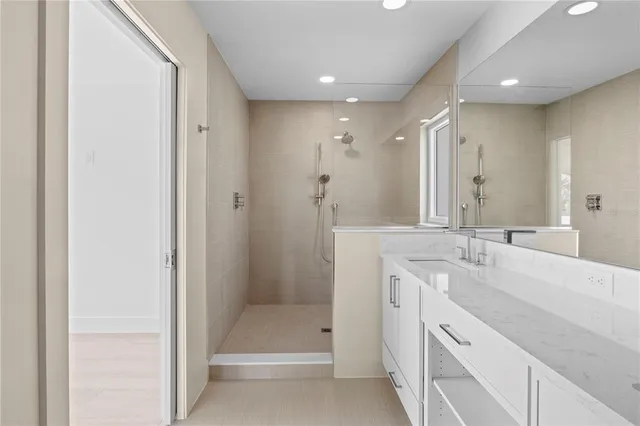 a view of a patio with couches table and chairs and potted plants