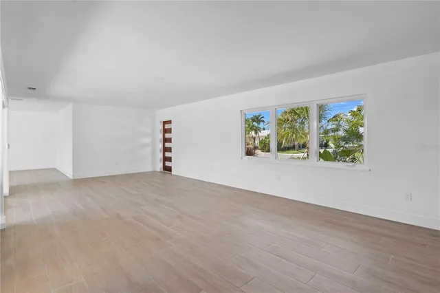 an empty room with window