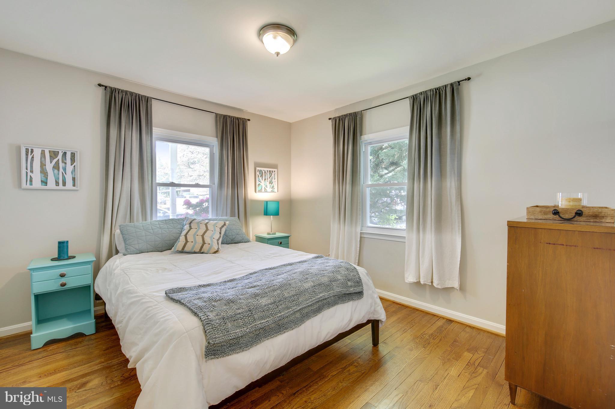 4418 Bennion Road Silver Spring, MD 20906 - Photo 12 of 23 a bedroom with a bed and a window