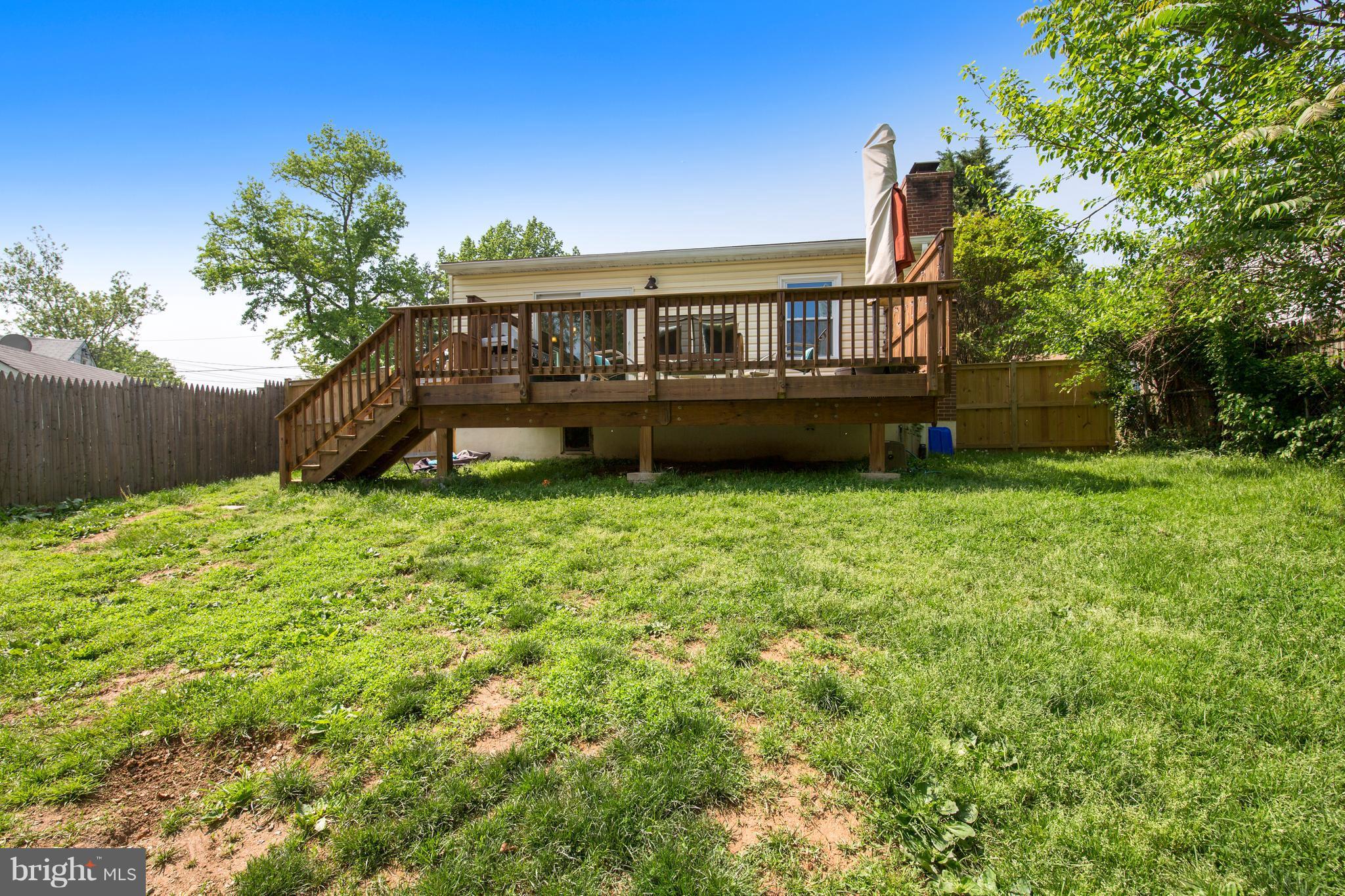 4418 Bennion Road Silver Spring, MD 20906 - Photo 19 of 23 a front view of a house with garden