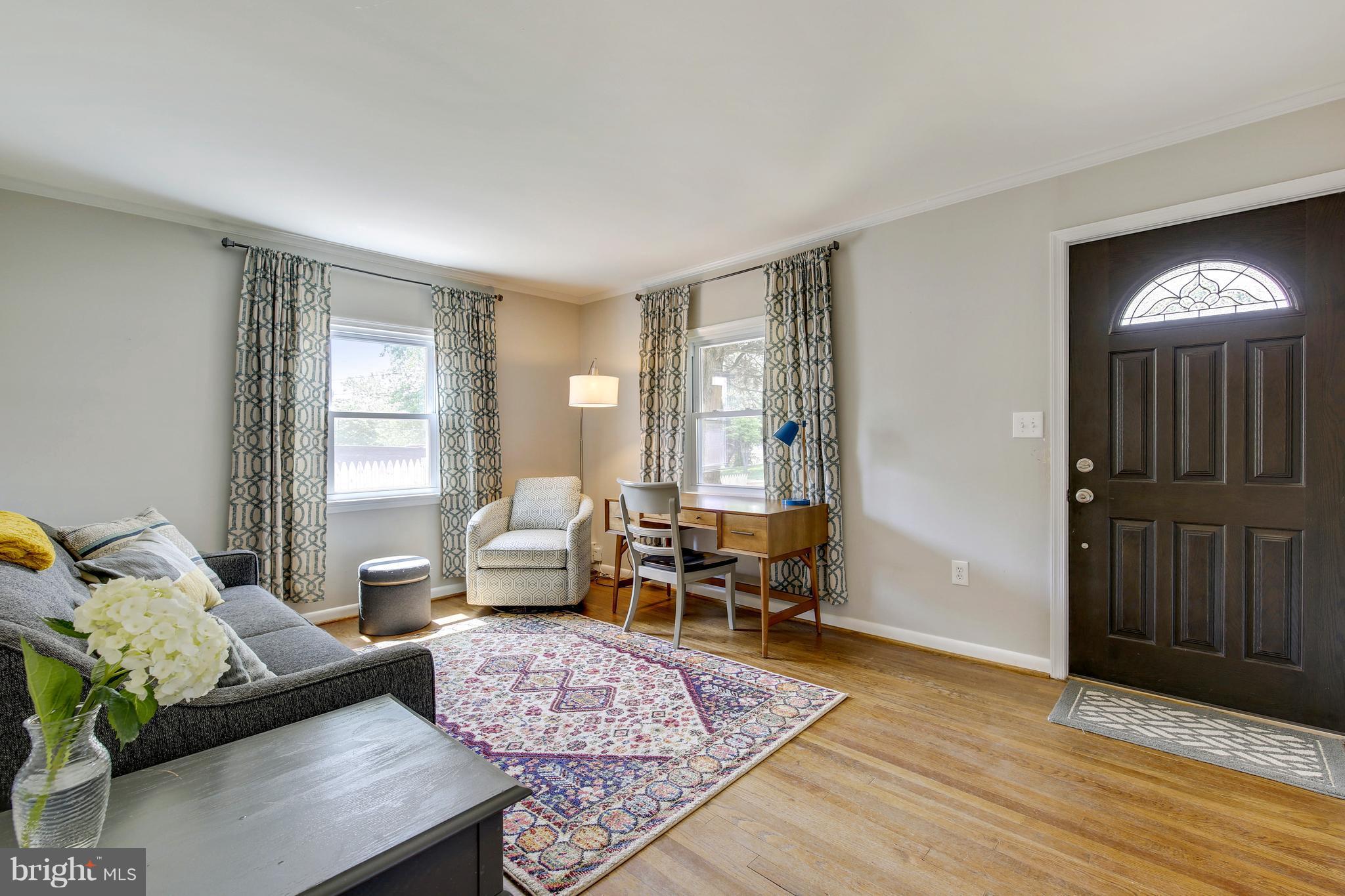 4418 Bennion Road Silver Spring, MD 20906 - Photo 3 of 23 a living room with furniture and a window